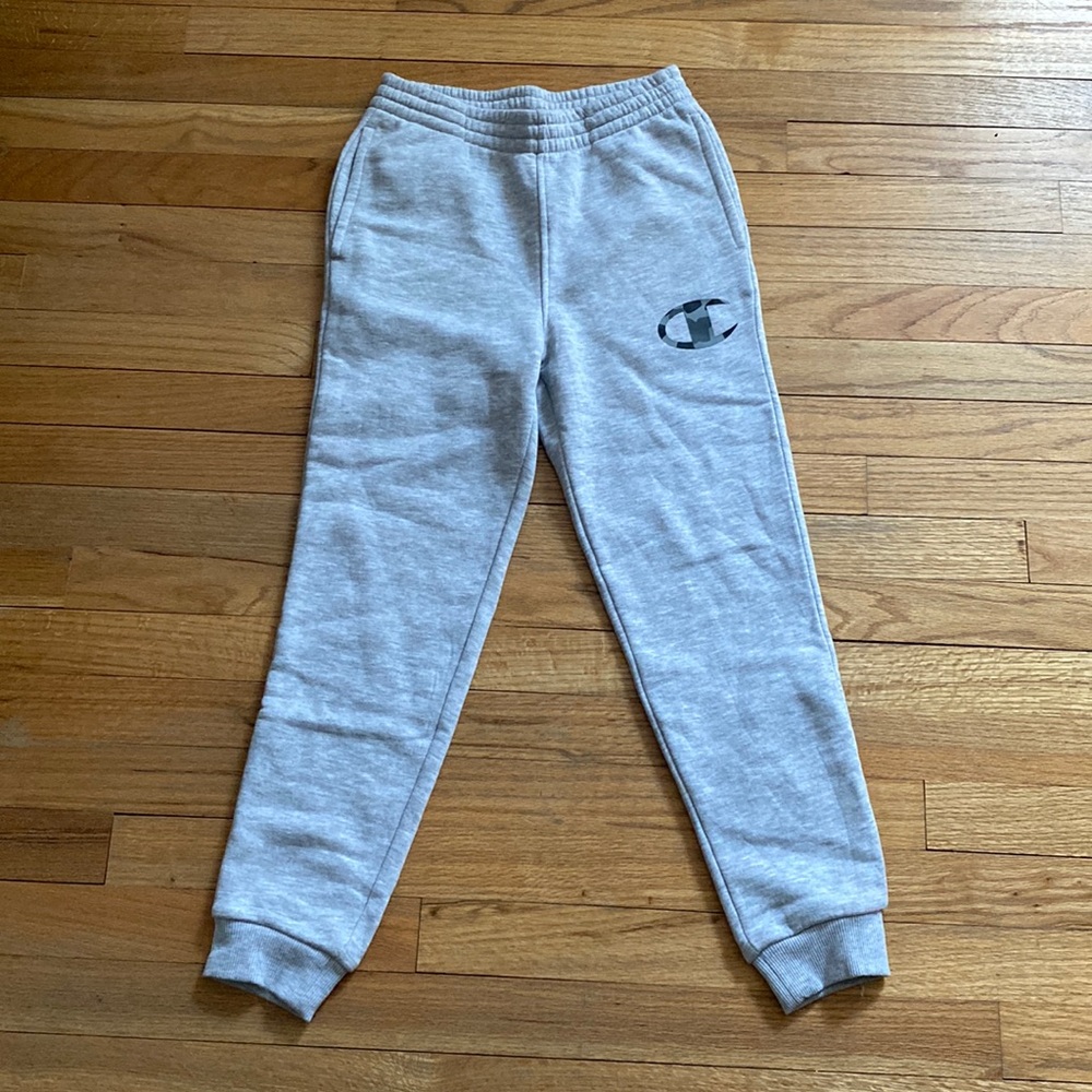 never worn . from champion . grey with camouflage champion logo on leg
